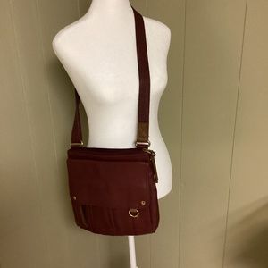 Fossil crossbody bag in ox blood red.